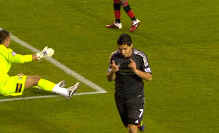 Suarez celebrates against Exeter City