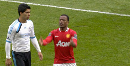 Patrice Evra and Luis Suarez Patrice Evra and Luis Suarez