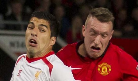 Suarez and Phil Jones exchange gurns