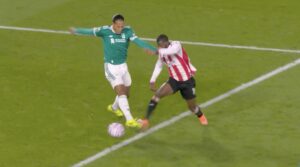 Virgil van Dijk concedes a penalty against Brentford.