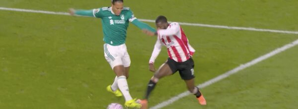 Virgil van Dijk concedes a penalty against Brentford.