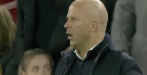 Arne Slot watches on as Forest score their third.